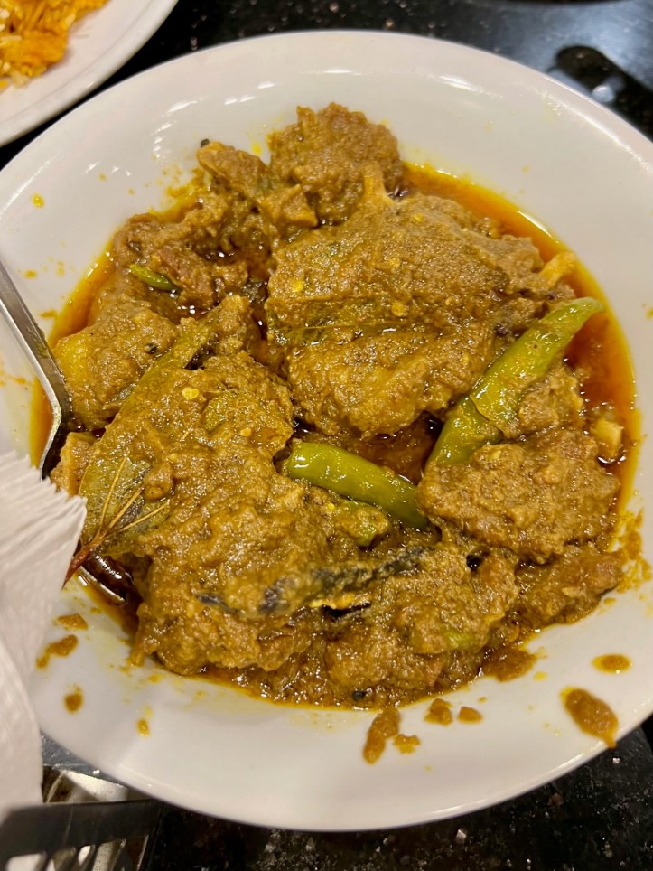 Beef rezala served in a bowl