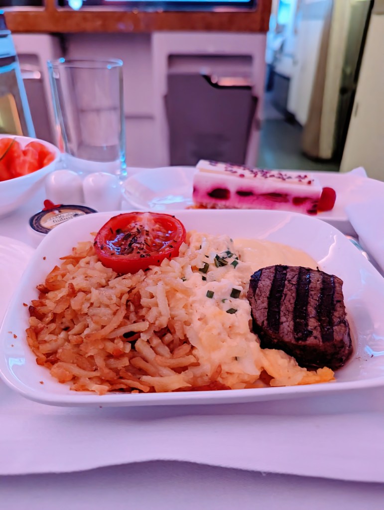 Emirates Airlines business class steak and eggs brunch main course