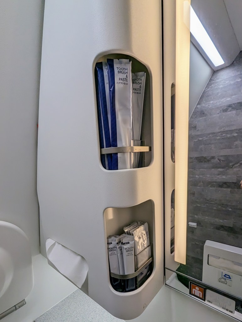 Toothbrush and mouth wash provided on ANA business class lavatory