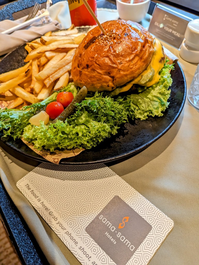 Burger and fries order through room service at Sama Sama Hotel in Kuala Lumpur Malaysia
