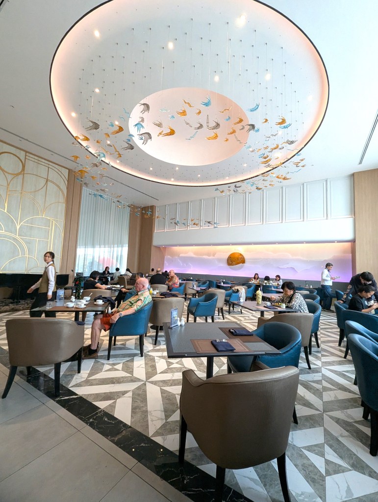 Breakfast hall at Siam Mandarina Hotel in Bangkok, Thailand.