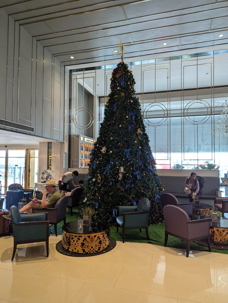 Guest sitting area in lobby of Siam Mandarina Hotel, Bangkok.