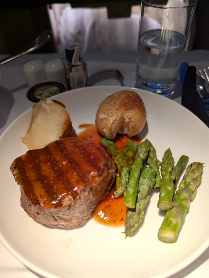 Grilled beef tenderloin served in business class of Emirates Airlines