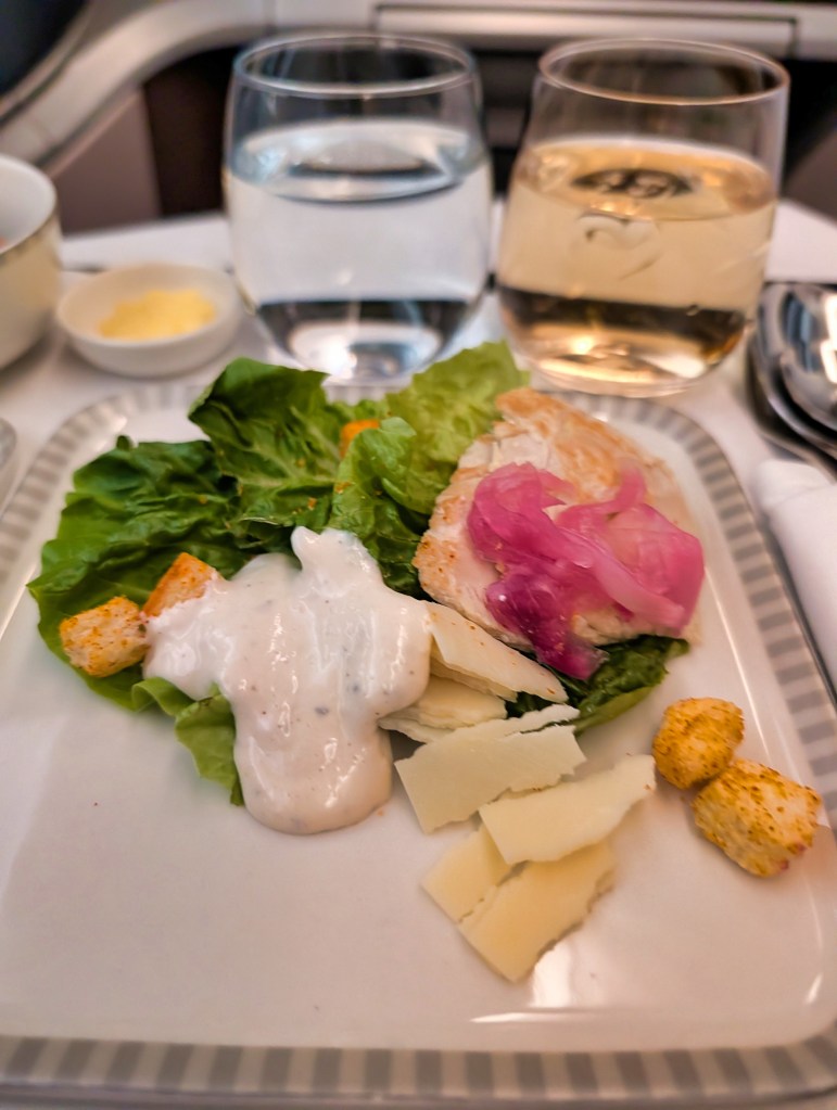 Singapore Airlines Business Class appetizer caesar salad with grilled chicken served on regional flight