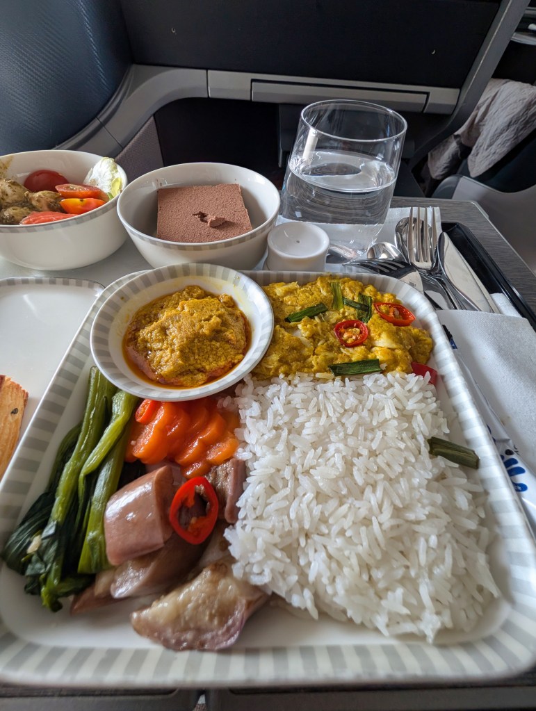Southern Thai crab curry or Pu Pad Pong Garee offered on Business Class of Singapore Airlines from Singapore to Bangkok Pu Pad Pong Garee or Southern Thai crab curry offered on Business Class in Singapore Airlines flying from Singapore to Bangkok