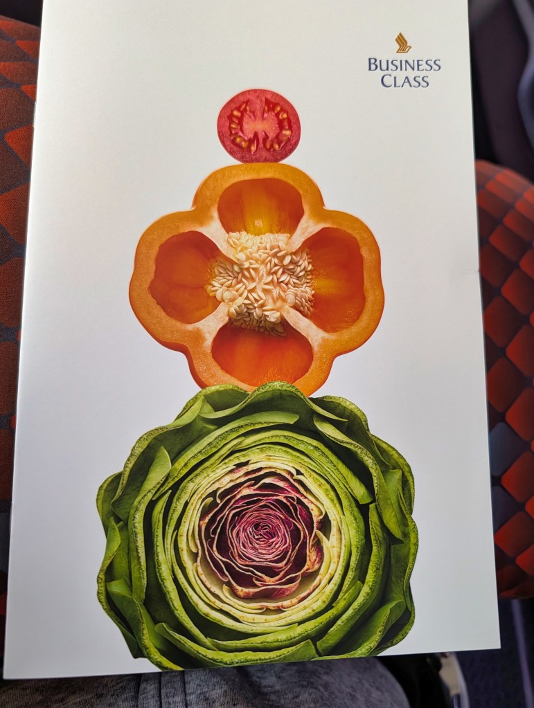 Menu cover in business class of Singapore Airlines Business class menu cover of Singapore Airlines