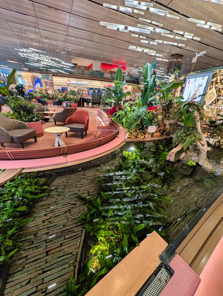 Natural decorations with mini ponds located at Terminal 1 of Singapore Changi Airport Mini ponds in Terminal 1 of Singapore Changi Airport