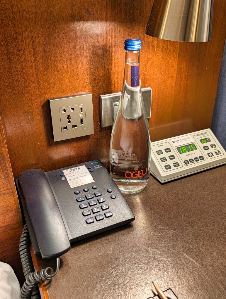 Bedside table showing telephone and master controller for room at Hyatt Regency Hotel Suvarnabhumi Hotel Bangkok