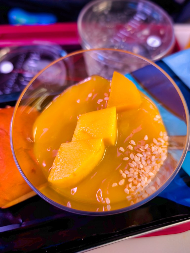 Mango pudding served on Qatar Airways economy class