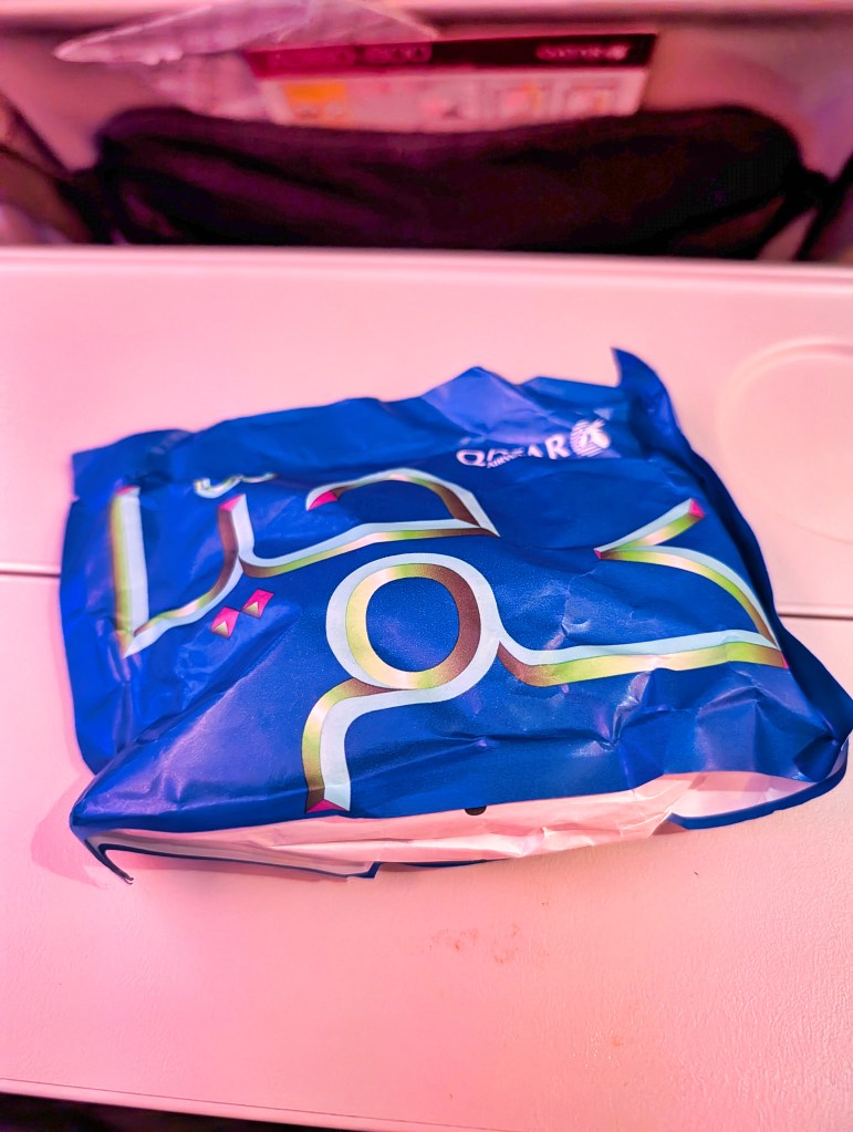 Amenity kit bag provided on Qatar Airways economy class