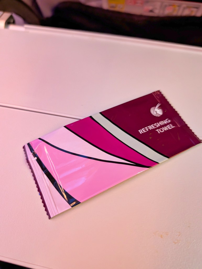 Refreshing towel provided on Qatar Airways economy class