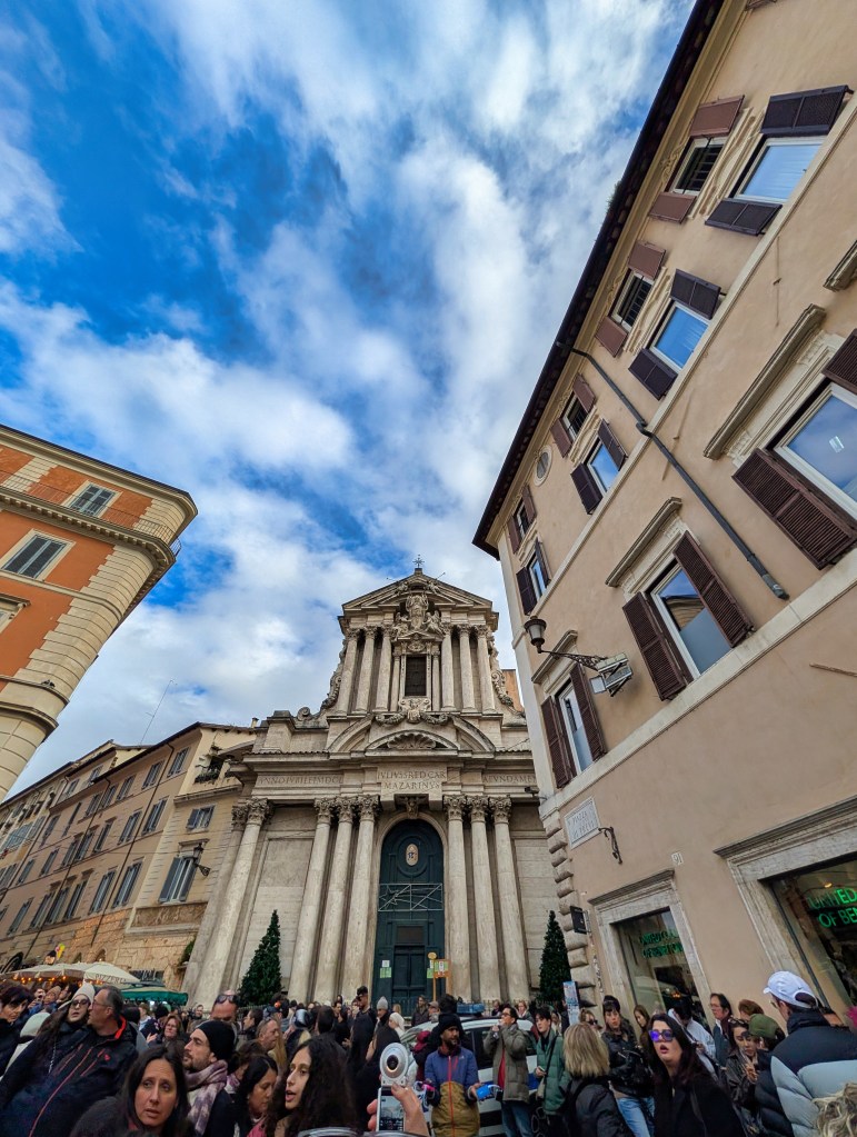 Church of Santi Vincenzo e Anastasio a Trevi located adjacent to Trevi Fountain in Rome, Italy.