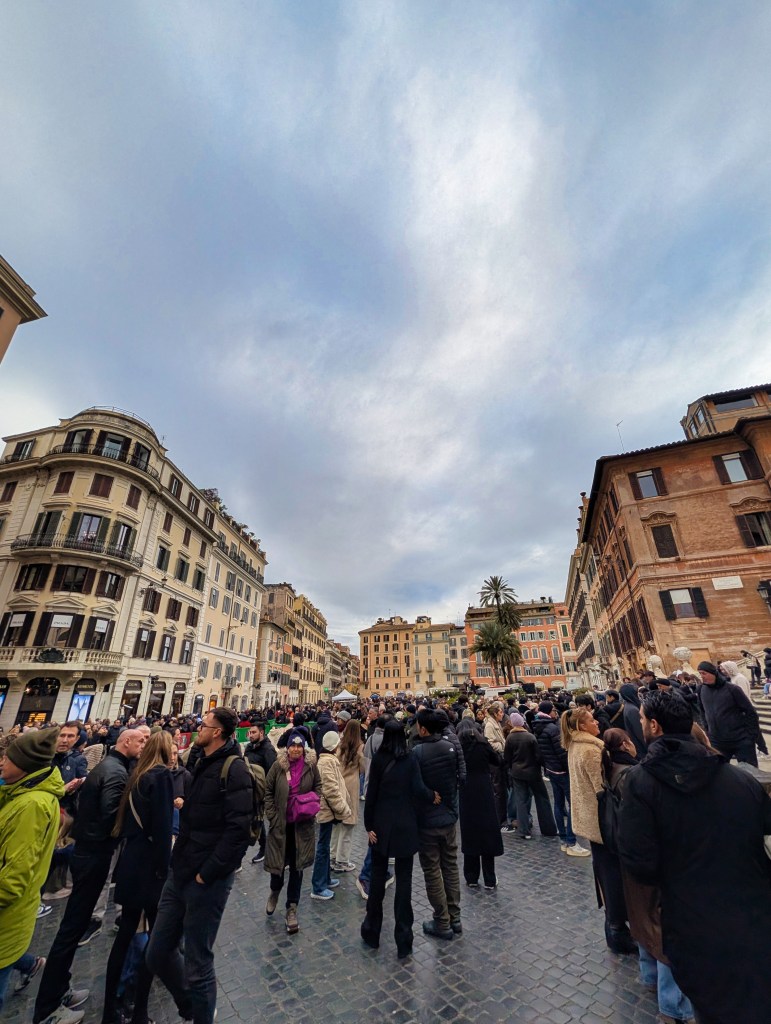 Tourists in Piazza di Spagna next to Spanish Steps in Rome, Italy.