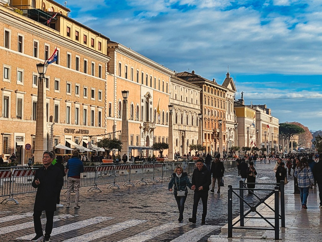 View of Via Della Conciliazione avenue with people walking